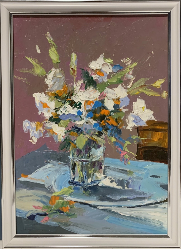White flowers in a glass vase.
