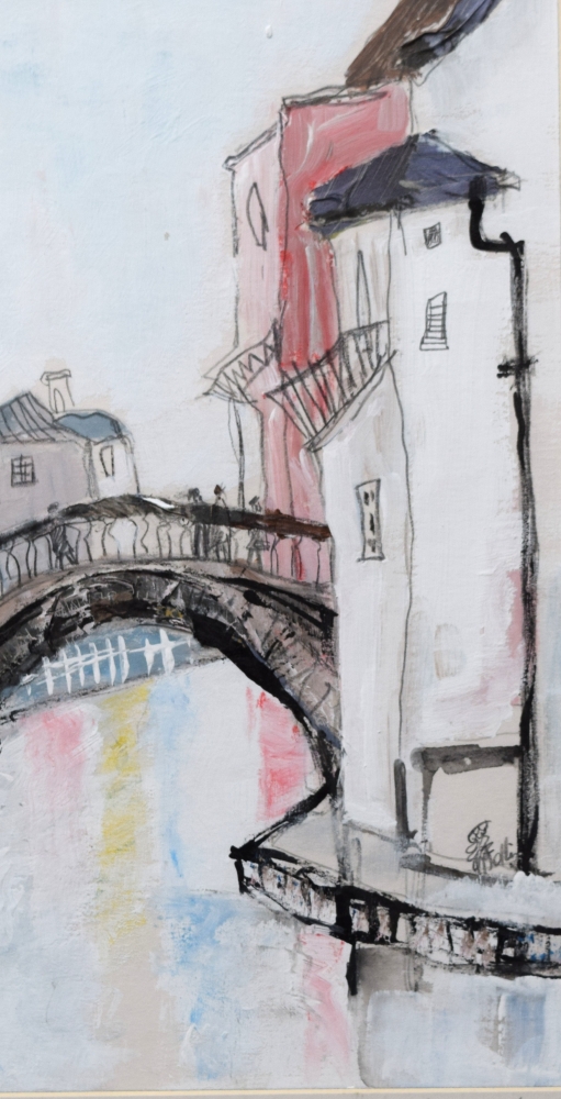 Pink house by the canal