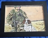 Military dog handler with snifffer cocka spaniel called Jess