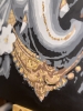 Divine Presence: Ganesha in Gold and Grace
