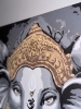 Divine Presence: Ganesha in Gold and Grace