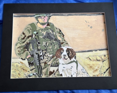 Military dog handler with snifffer cocka spaniel called Jess