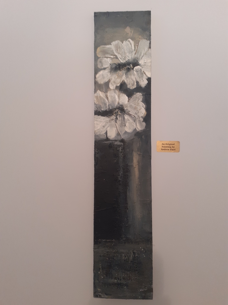 White flowers in black vase (1)