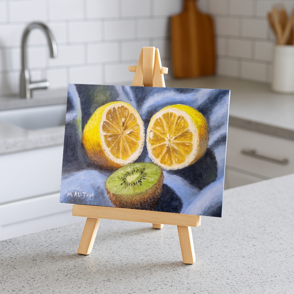 Lemon and Kiwi Fruit on Blue Cloth