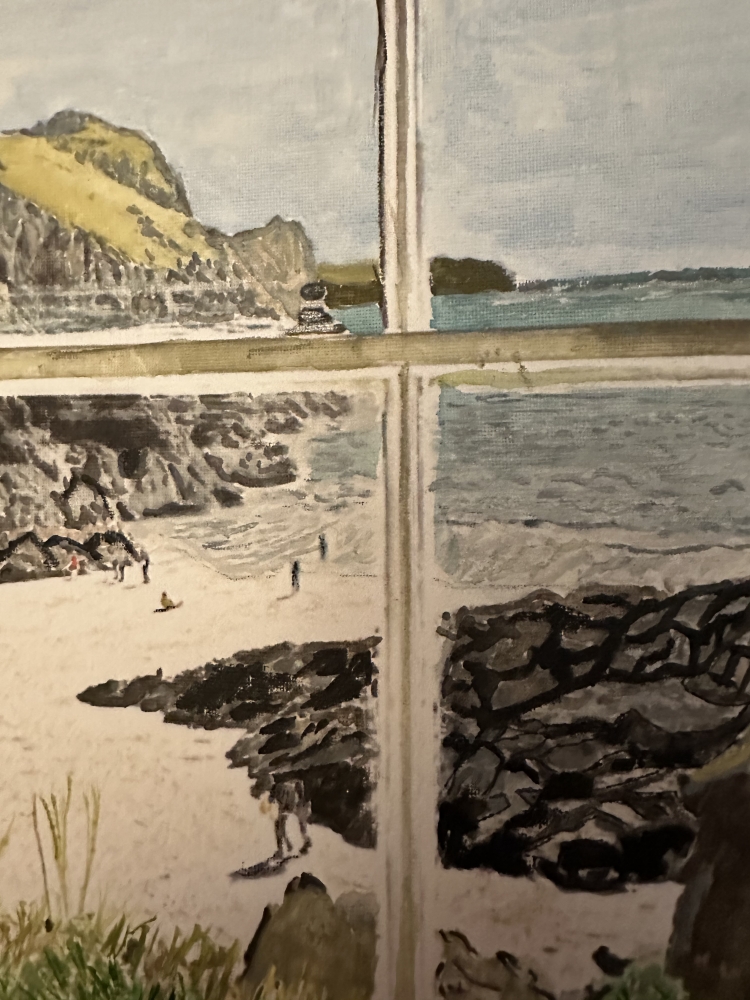 Veiw through a window of a coastal path 