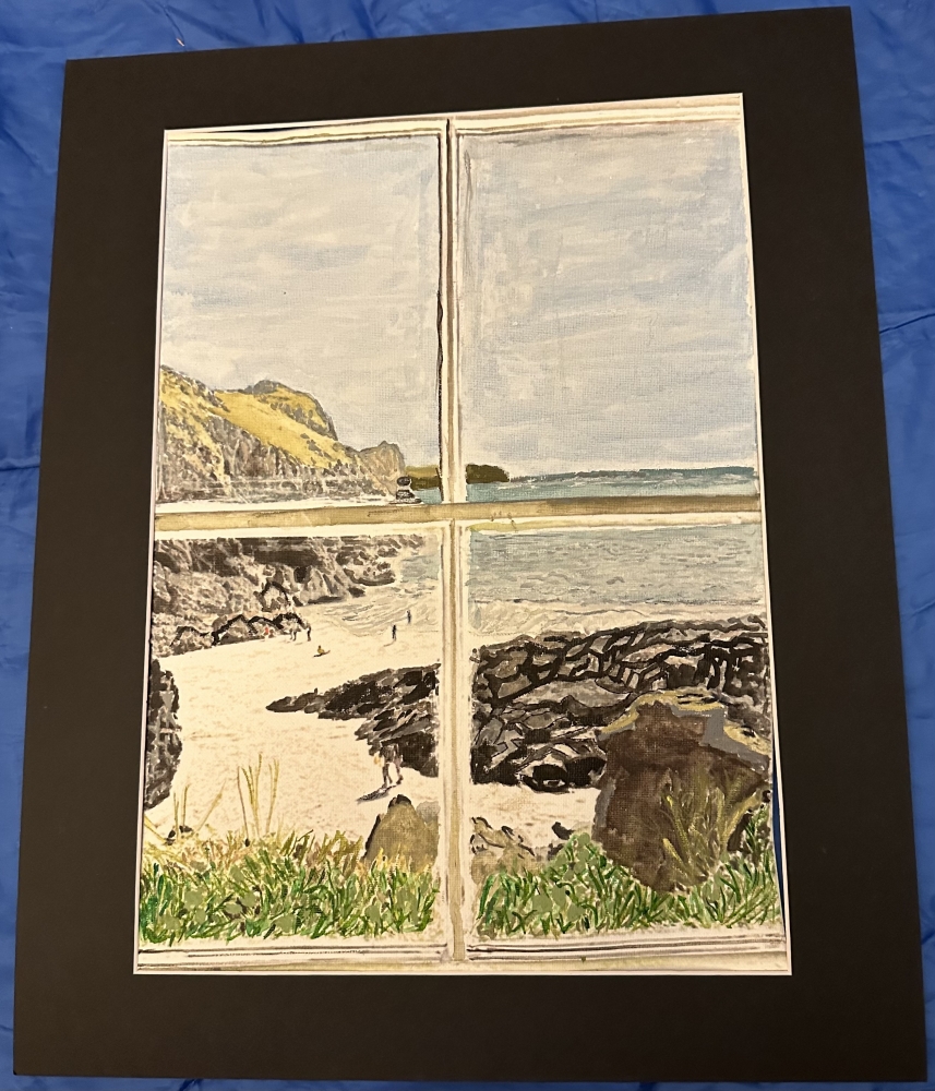 Veiw through a window of a coastal path 