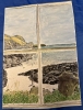 Veiw through a window of a coastal path 