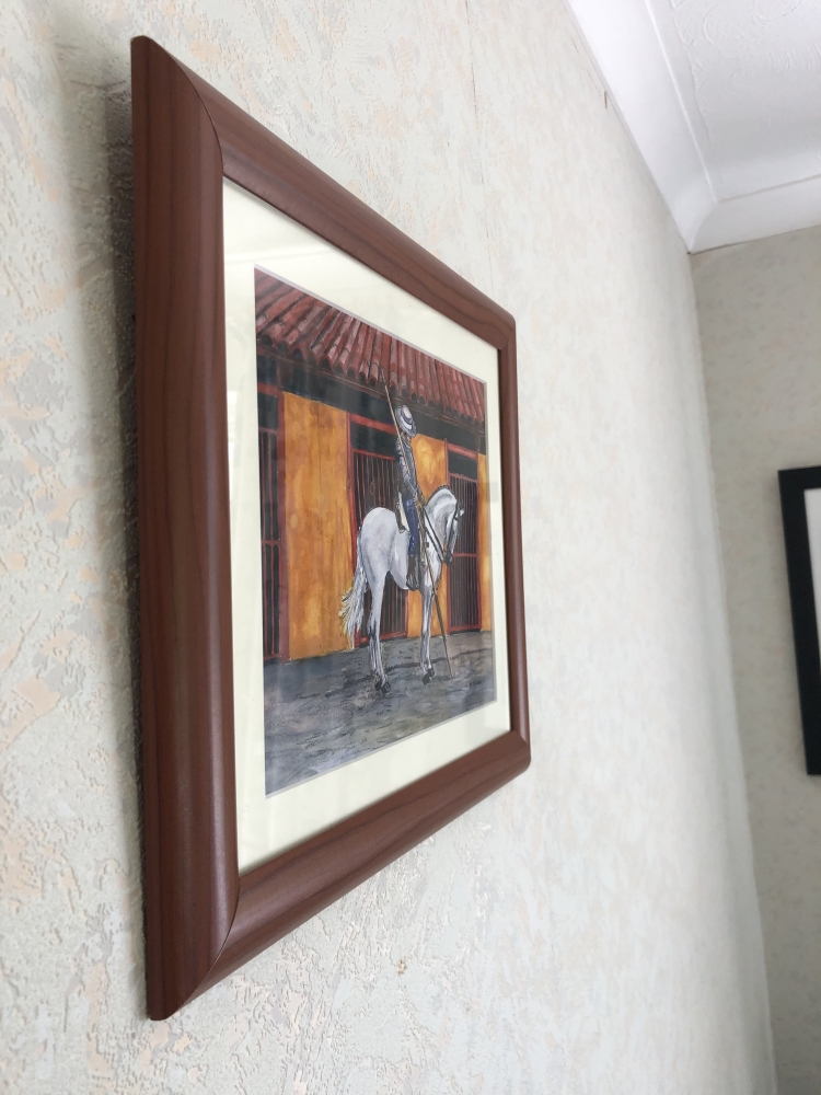 Spanish Horseman at Stable