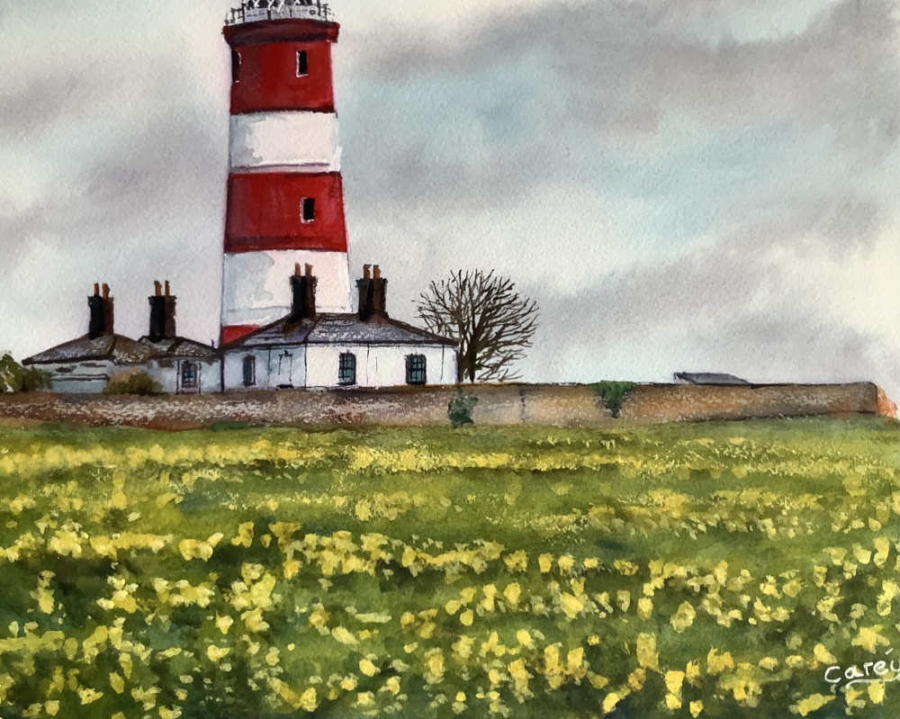 Lighthouse amongst sea of gold