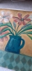 Flowers in a blue jug