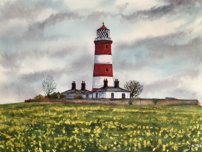 Lighthouse amongst sea of gold