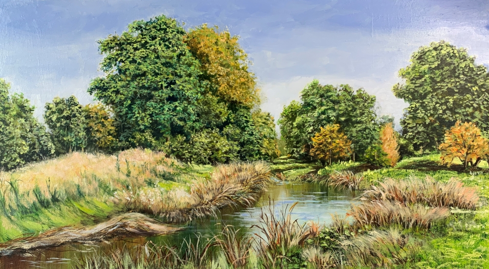 Landscape with a pond and forest.