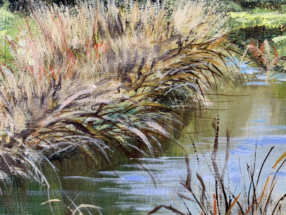 Landscape with a pond and forest.