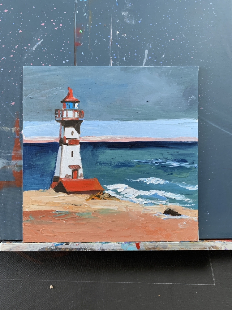 Seascape with lighthouse on a sea shore