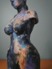 Woman, sculpture made in clay and painted with an abstract pattern