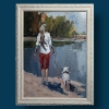 Woman walking with a dog.