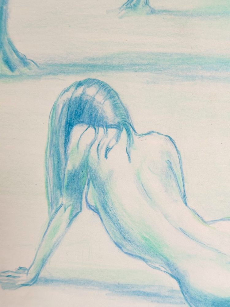 Nude resting on an olive tree beach