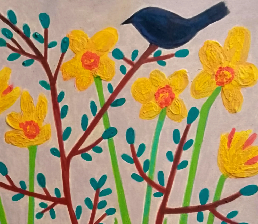 Terracotta pot with daffodils and blackbirds