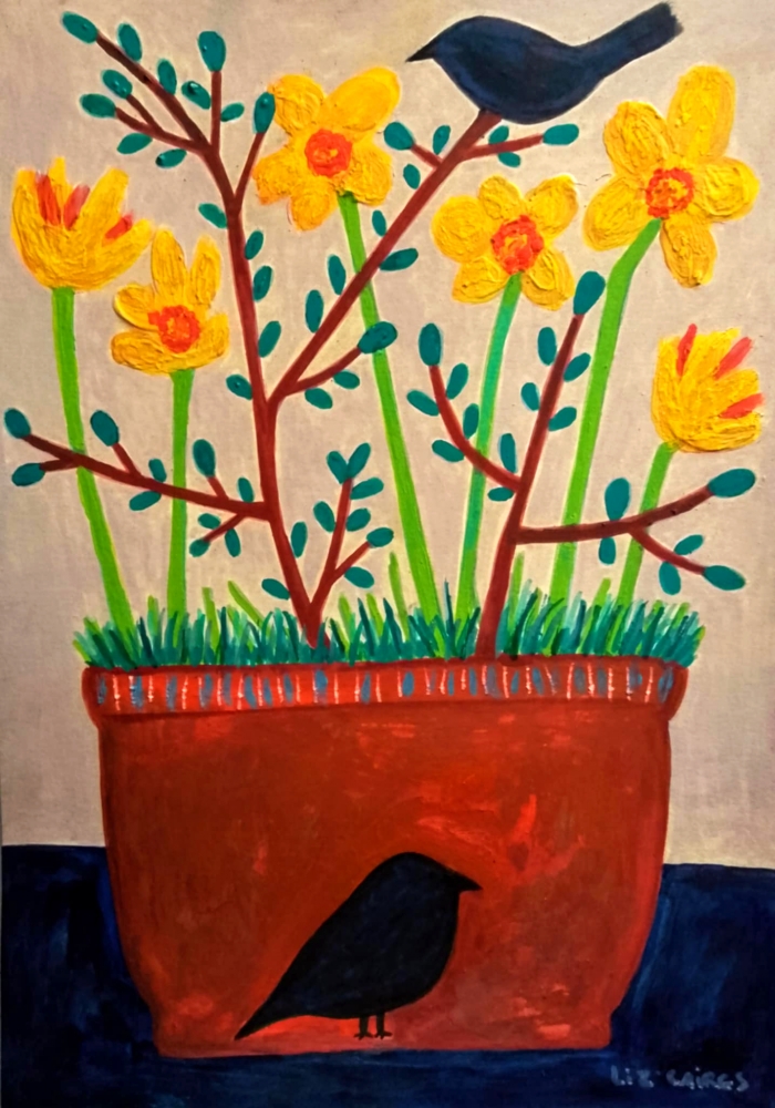 Terracotta pot with daffodils and blackbirds