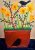 Terracotta pot with daffodils and blackbirds