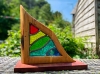 Satis, a stunning sculpture, made from spalted beech and stained glass