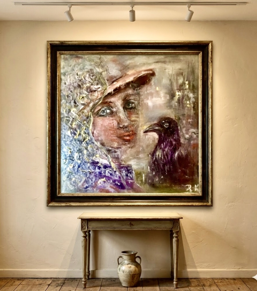 A visitor from Before-woman with a raven painting