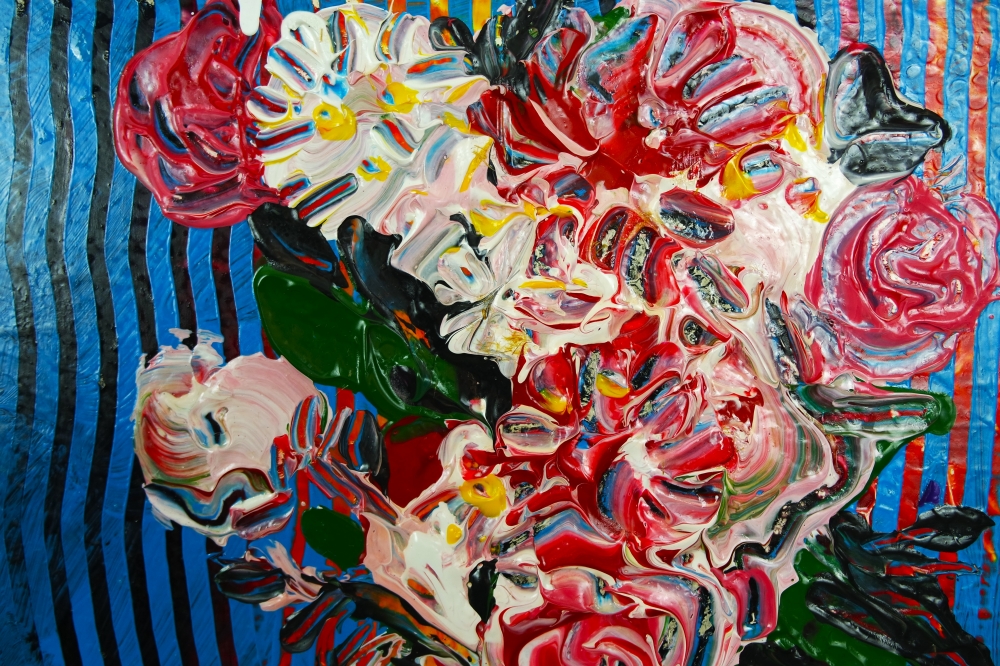Flowers in tall vase on table expressions 810