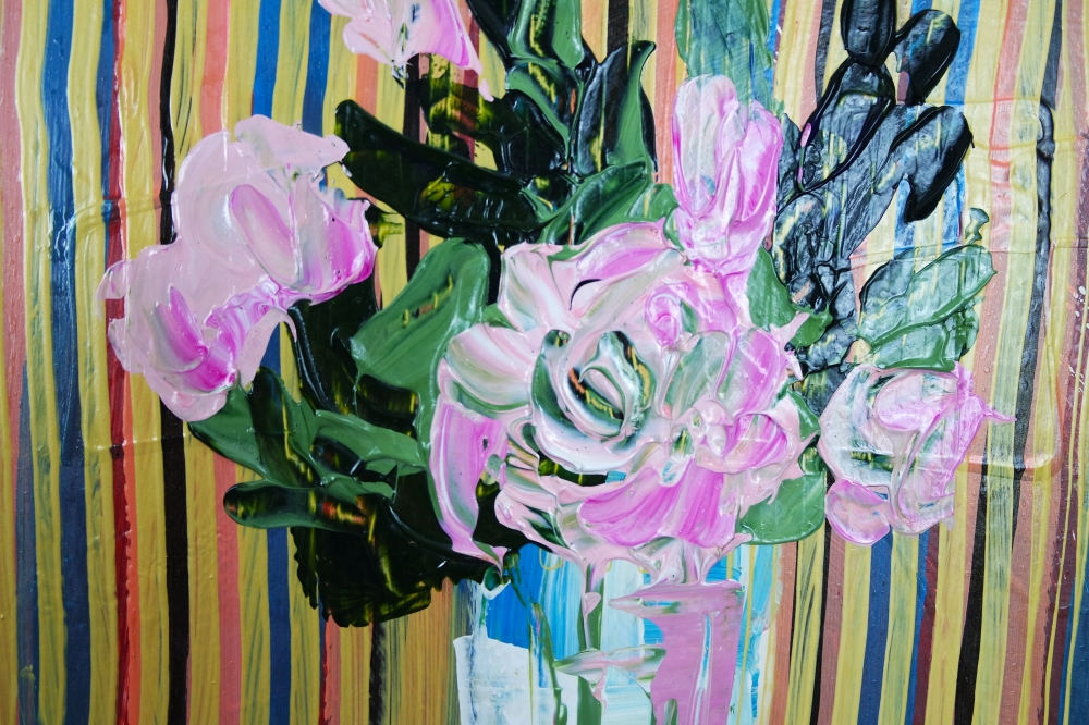 Pink flowers in vase on table expressions 800