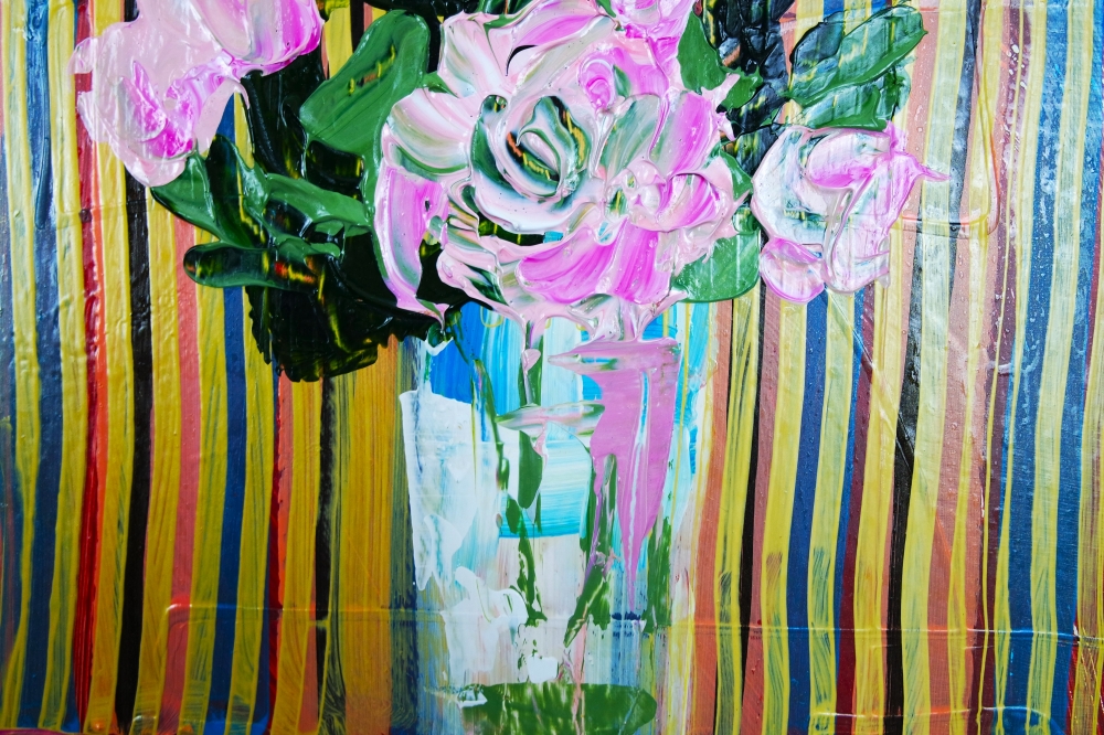 Pink flowers in vase on table expressions 800