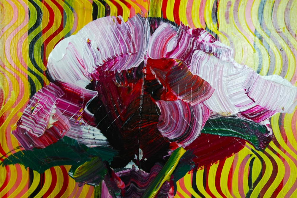 Red and white flowers in vase on table expressions 825