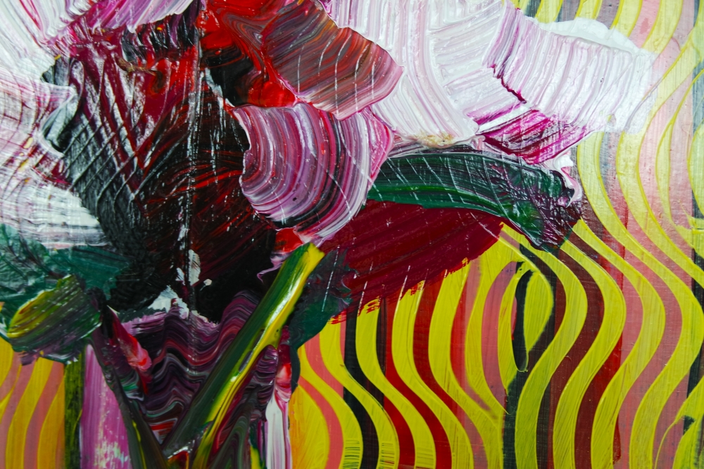 Red and white flowers in vase on table expressions 825