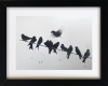 Swallows on a line (framed)
