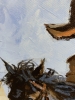 Cowboy on a Black Horse Across a Dusty Prairie.