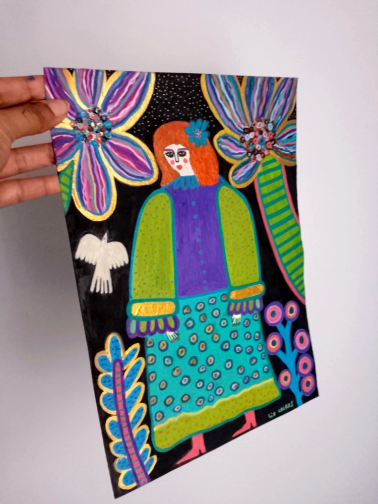 Woman in a tropical garden