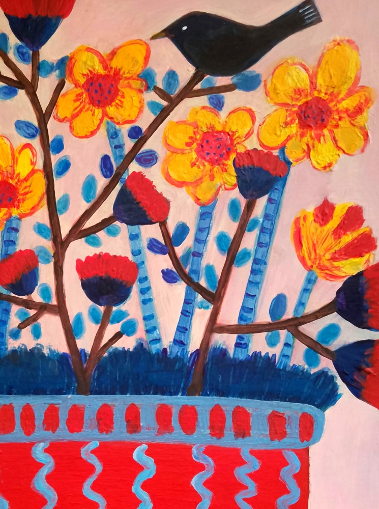 Pot of daffodils and a blackbird