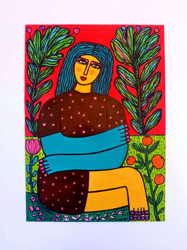 Woman sat in her garden