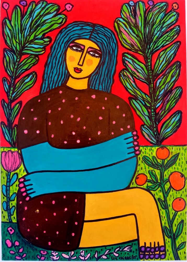 Woman sat in her garden