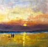 Couple on beach with dog framed