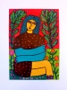 Woman sat in her garden