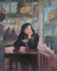 Young Woman in a Cafe