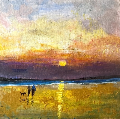 Couple on beach with dog framed