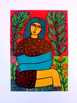 Woman sat in her garden