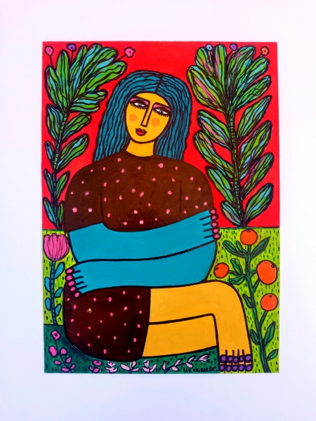 Woman sat in her garden