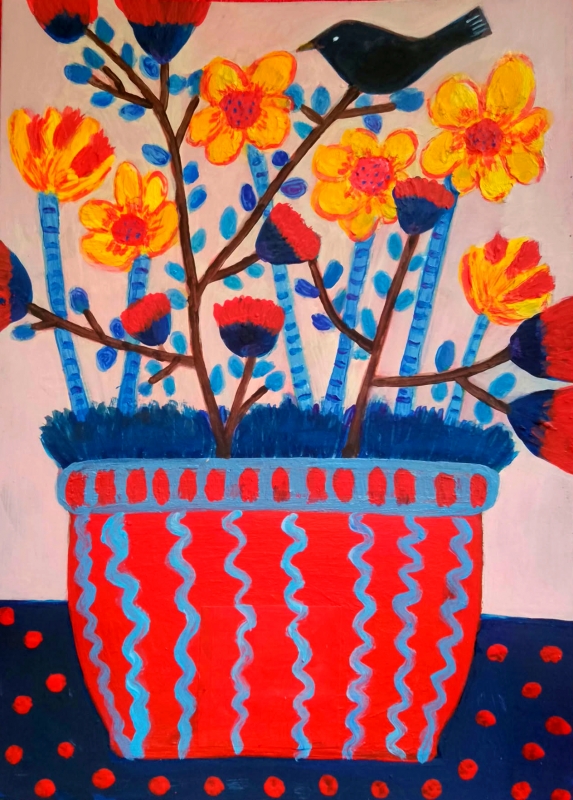 Pot of daffodils and a blackbird