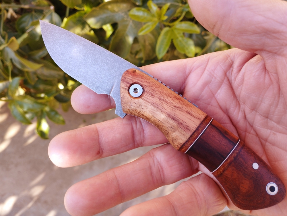 Mixed wood handle friction folder