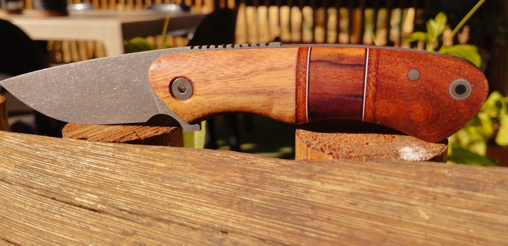 Mixed wood handle friction folder