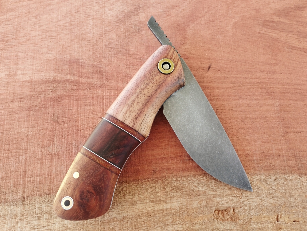 Mixed wood handle friction folder