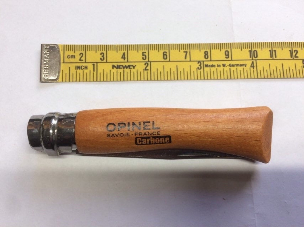 Opinel No. 7VRN locking Carbon Steel Blade Beech Handle, a handy hand size