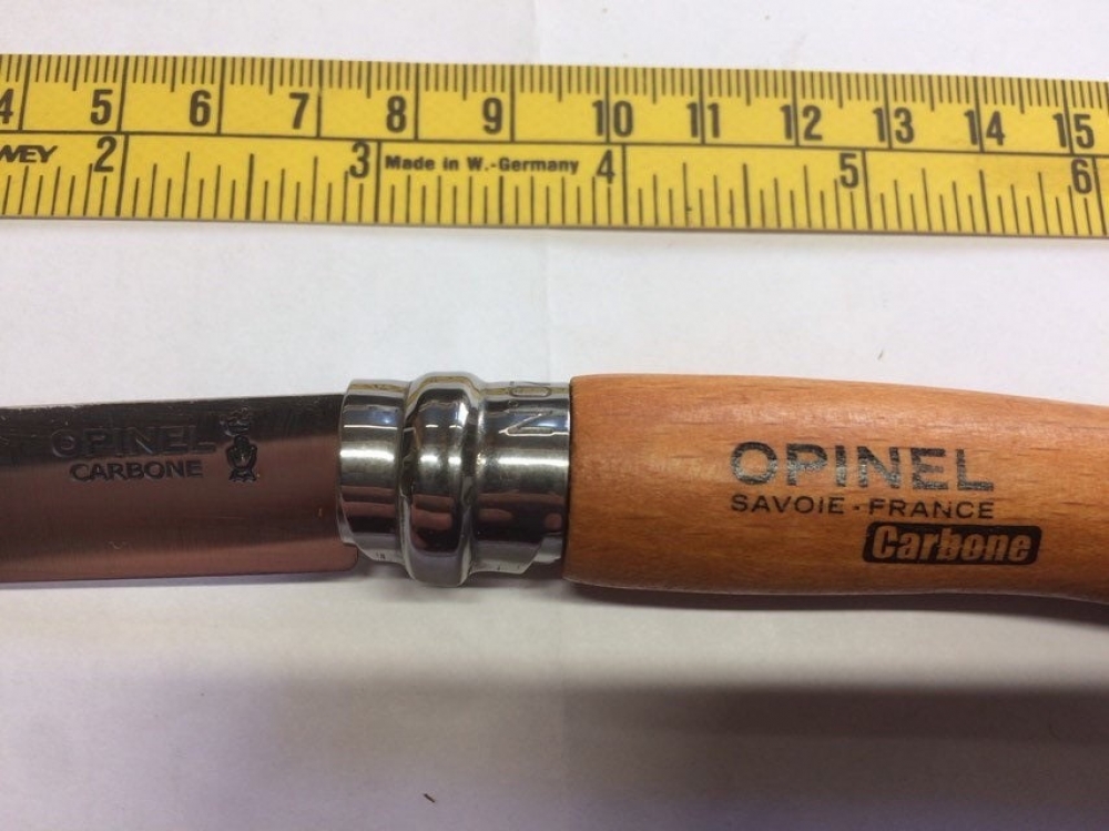 Opinel No. 7VRN locking Carbon Steel Blade Beech Handle, a handy hand size