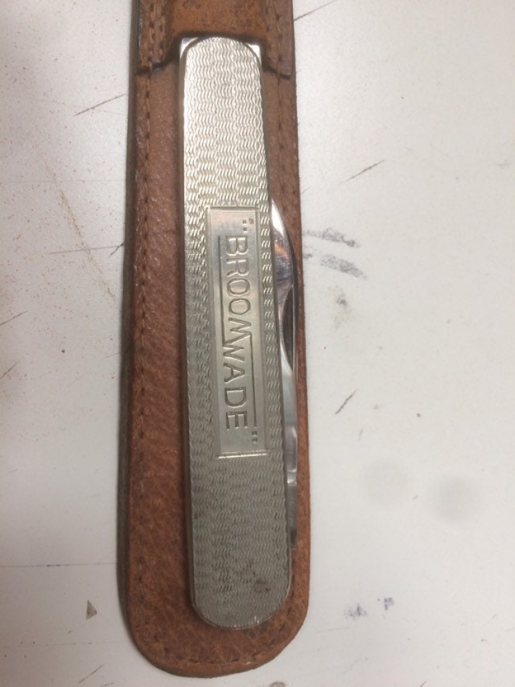 BroomWade letter knife in leather sheath. Stainless 9 1/4\" closed length 11 1/4\" opened length.